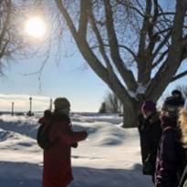 A group of people standing in snow

AI-generated content may be incorrect.